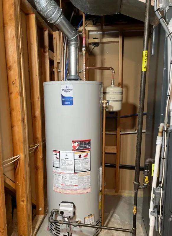 Water heater installed in a framed utility space